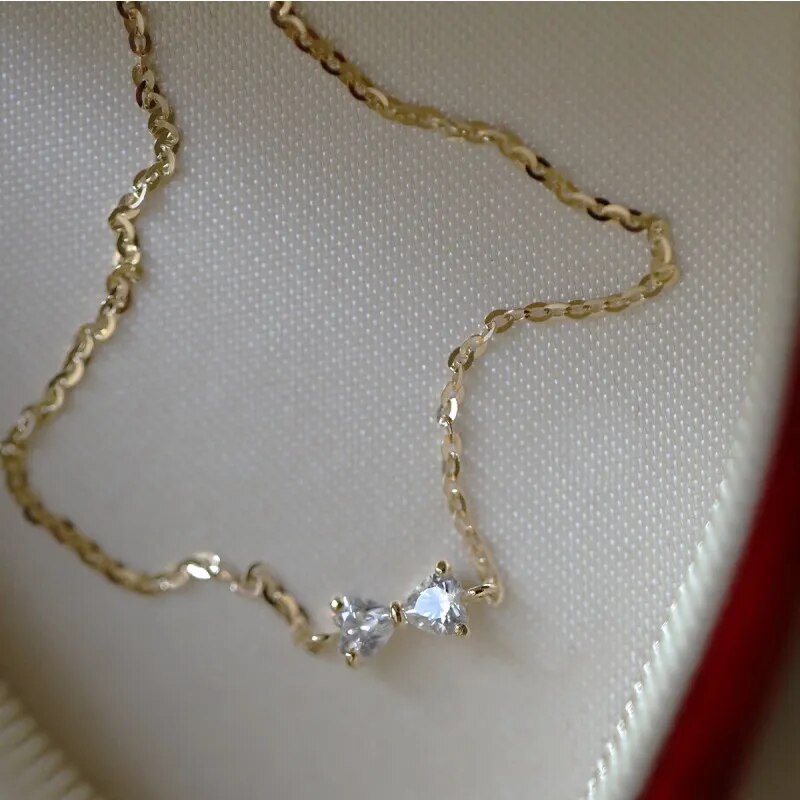 Golden Bow Elegance: 925 Sterling Silver Plated 14k Gold Zircon Bow Bracelet